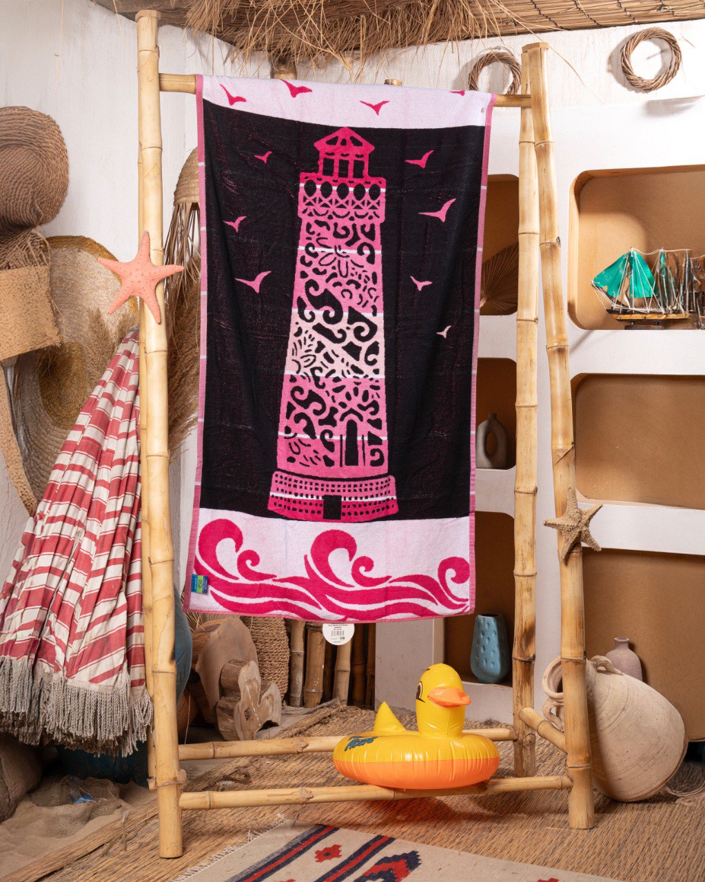 Pink tower beach Towel